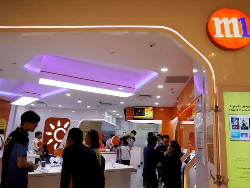 M1 customers shop at the telco’s outlets