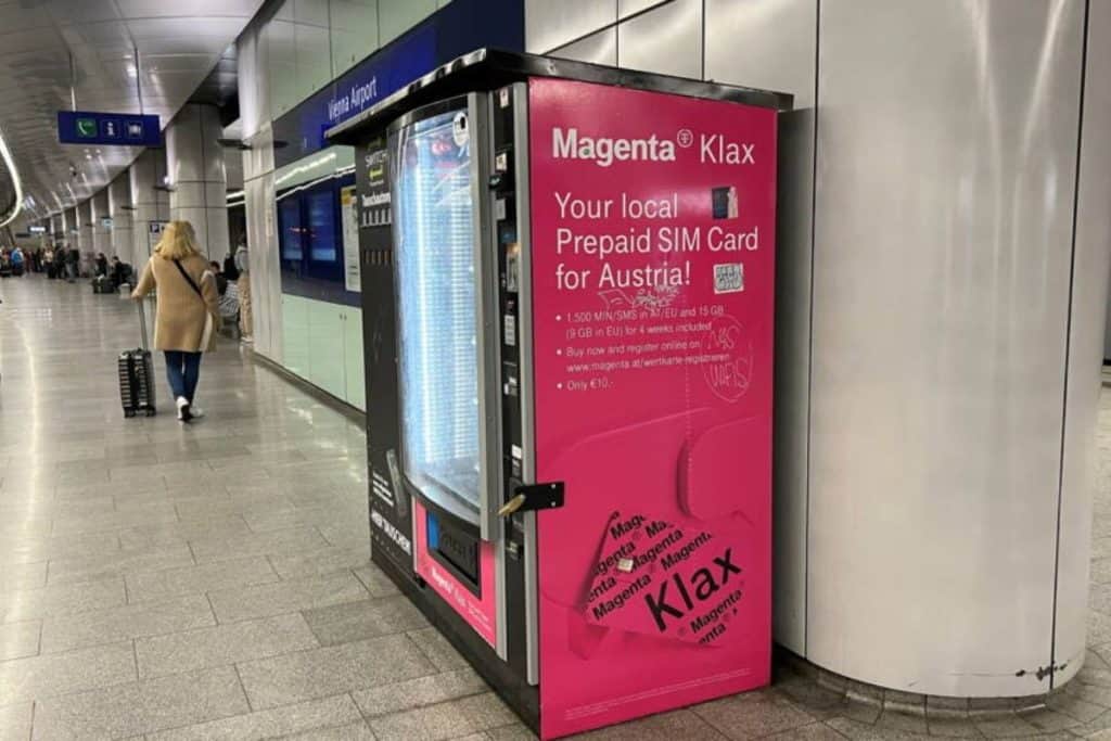 Find operator kiosks in the airport to buy a SIM card