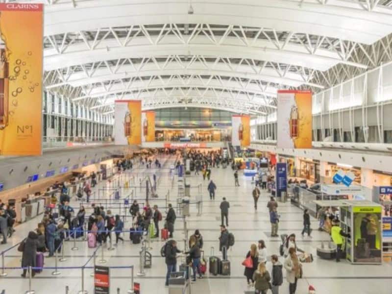 Buy a SIM card at the carrier kiosk at the airport