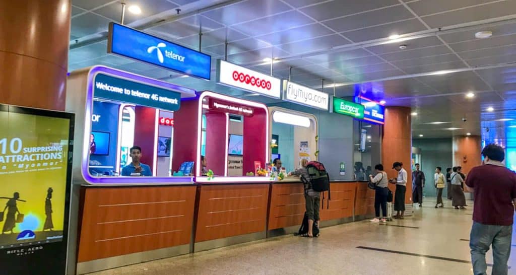 Many kiosks at airports sell Myanmar SIM Card